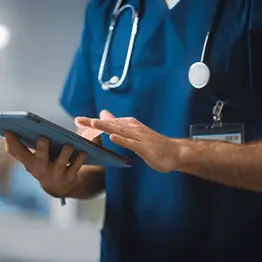 Nurse holding a tablet