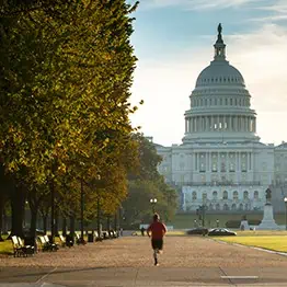 Man running near Capitol Building